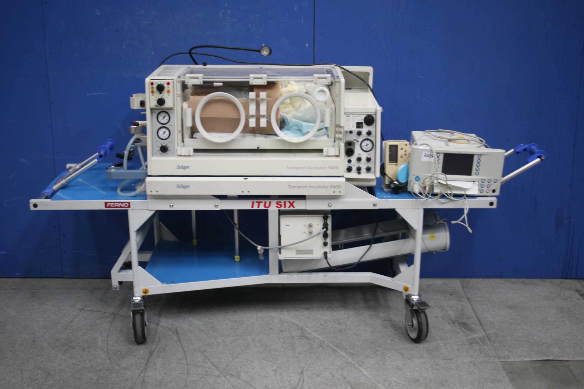 Drager Transport Incubator 5400 With Ferno ITU SIX Trolley,