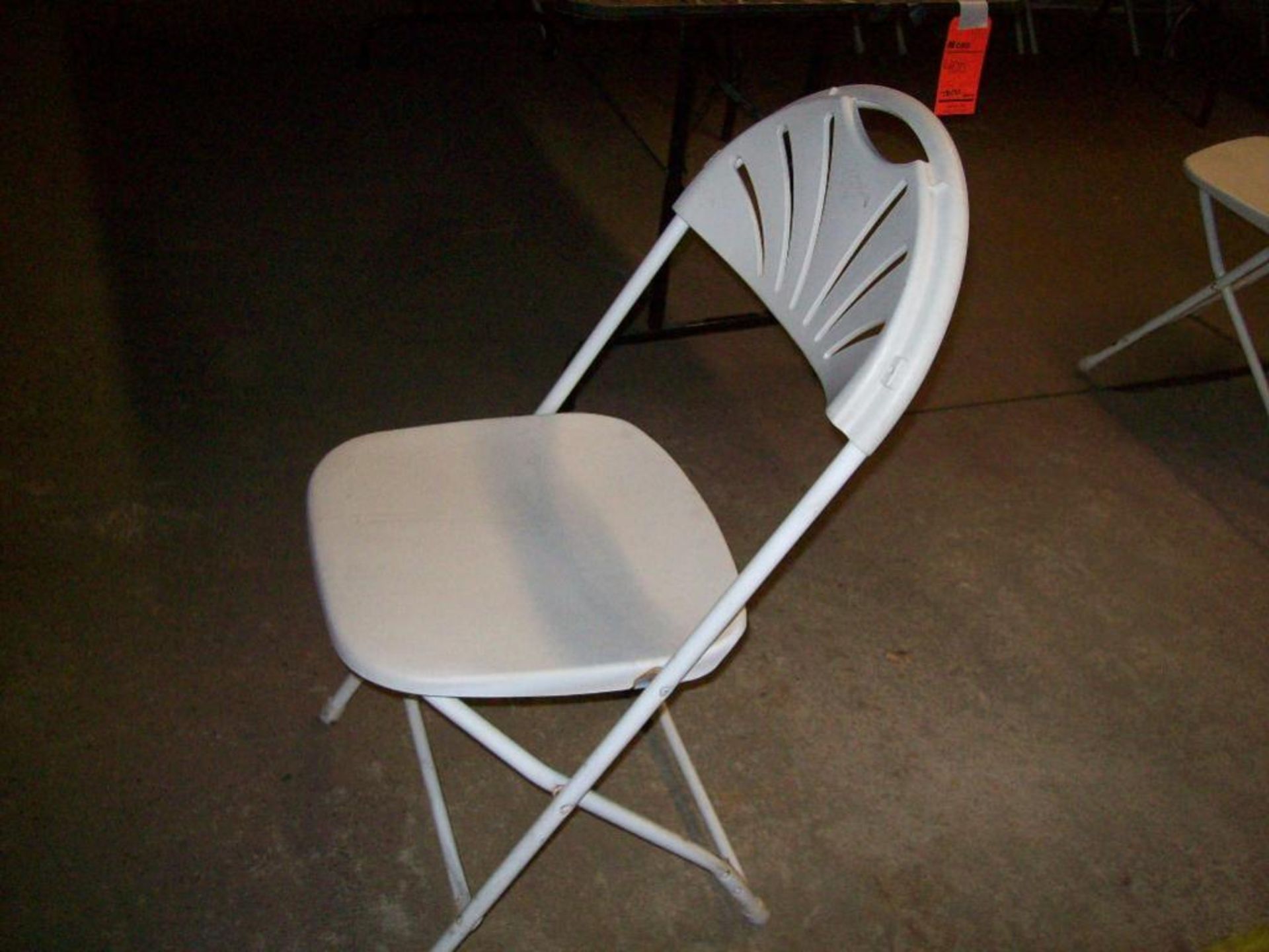 Samsonite Comm 2000 series white folding chairs