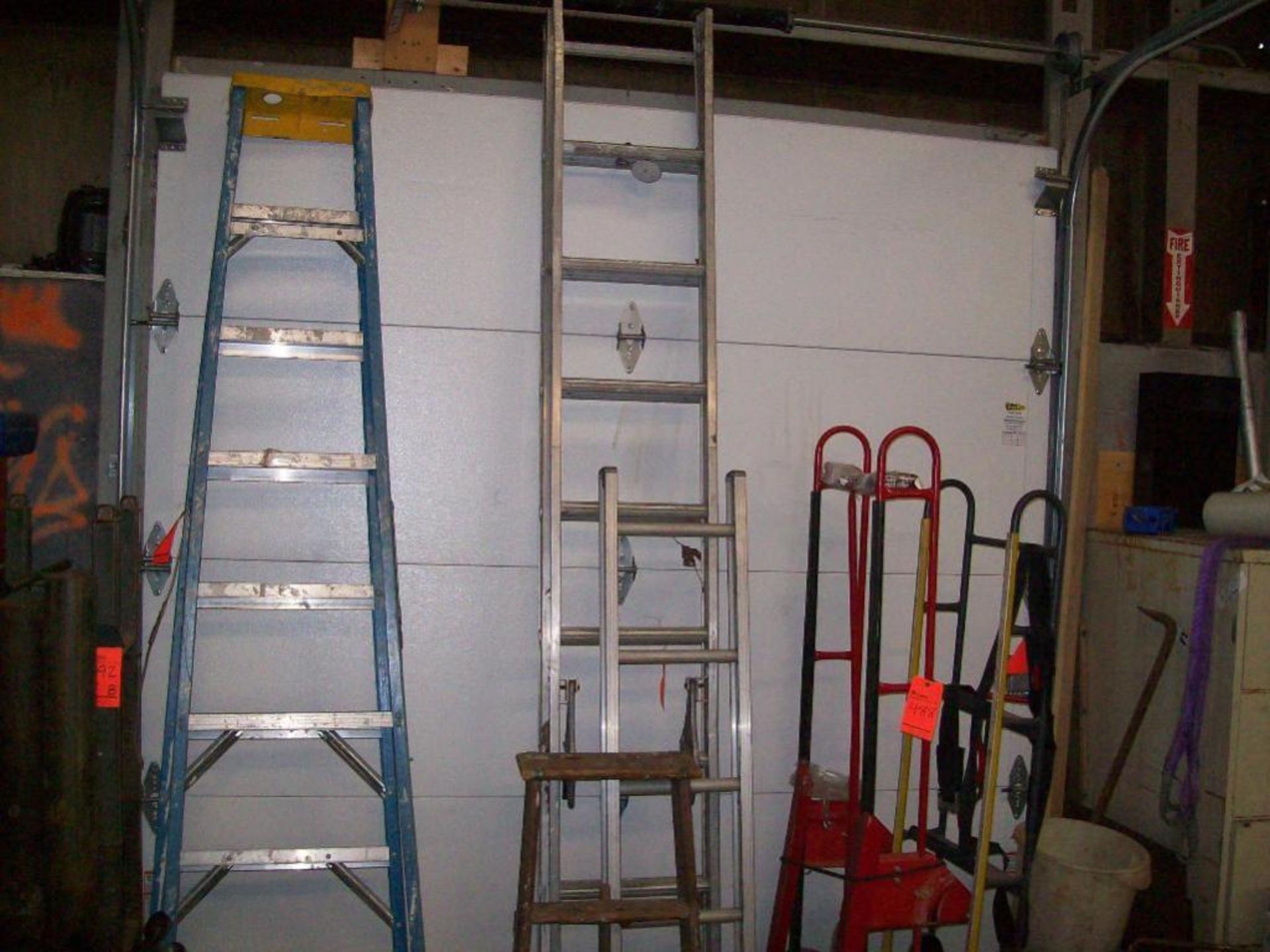 Lot consisting of (1) 15' fiberglass ladder, (1) 15' aluminum ladder ext., and (2) 8' fiberglass ste