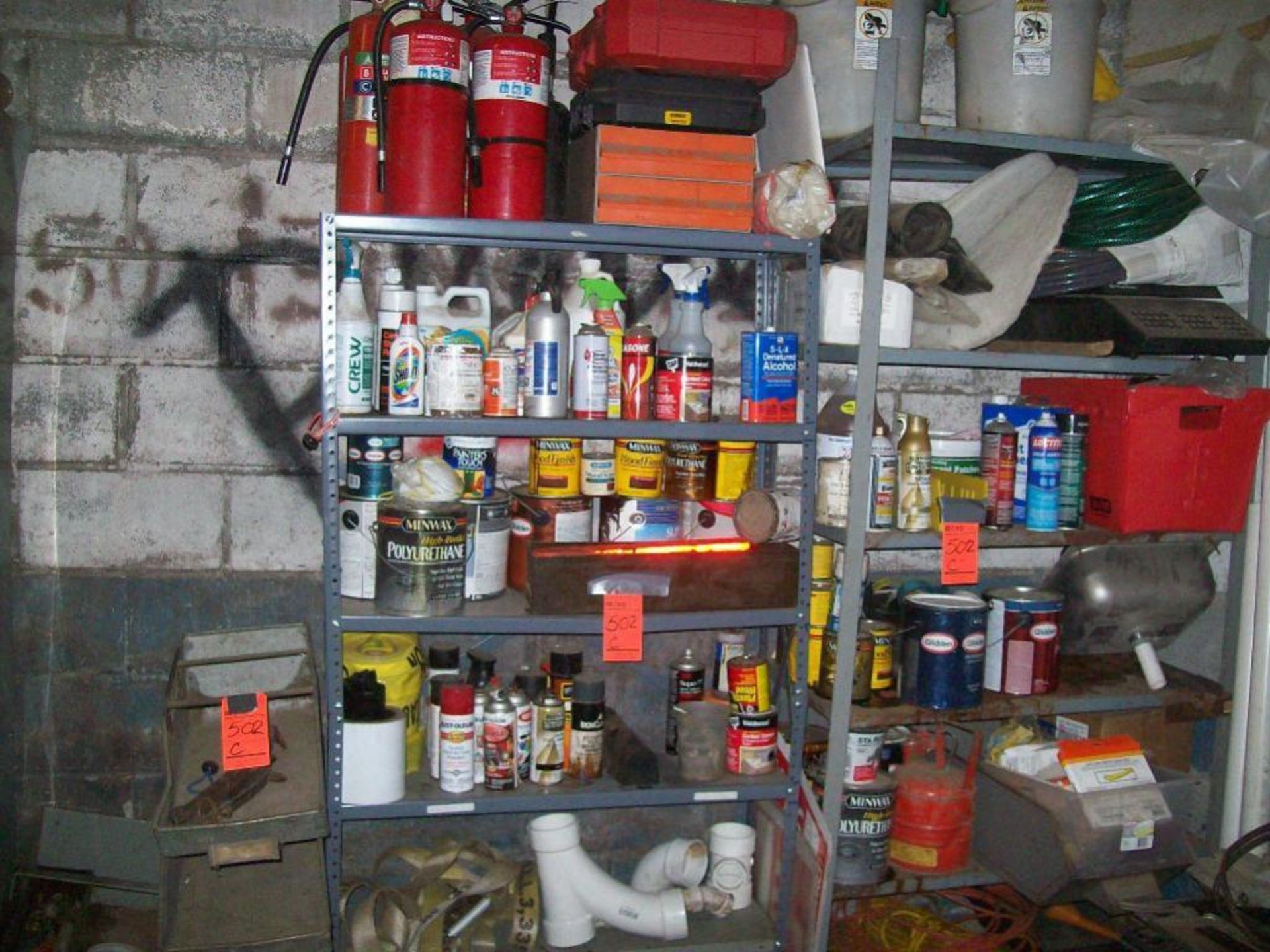 Lot of (2) sections of shelving with contents including fire extinguishers, cleaners, chemicals, par