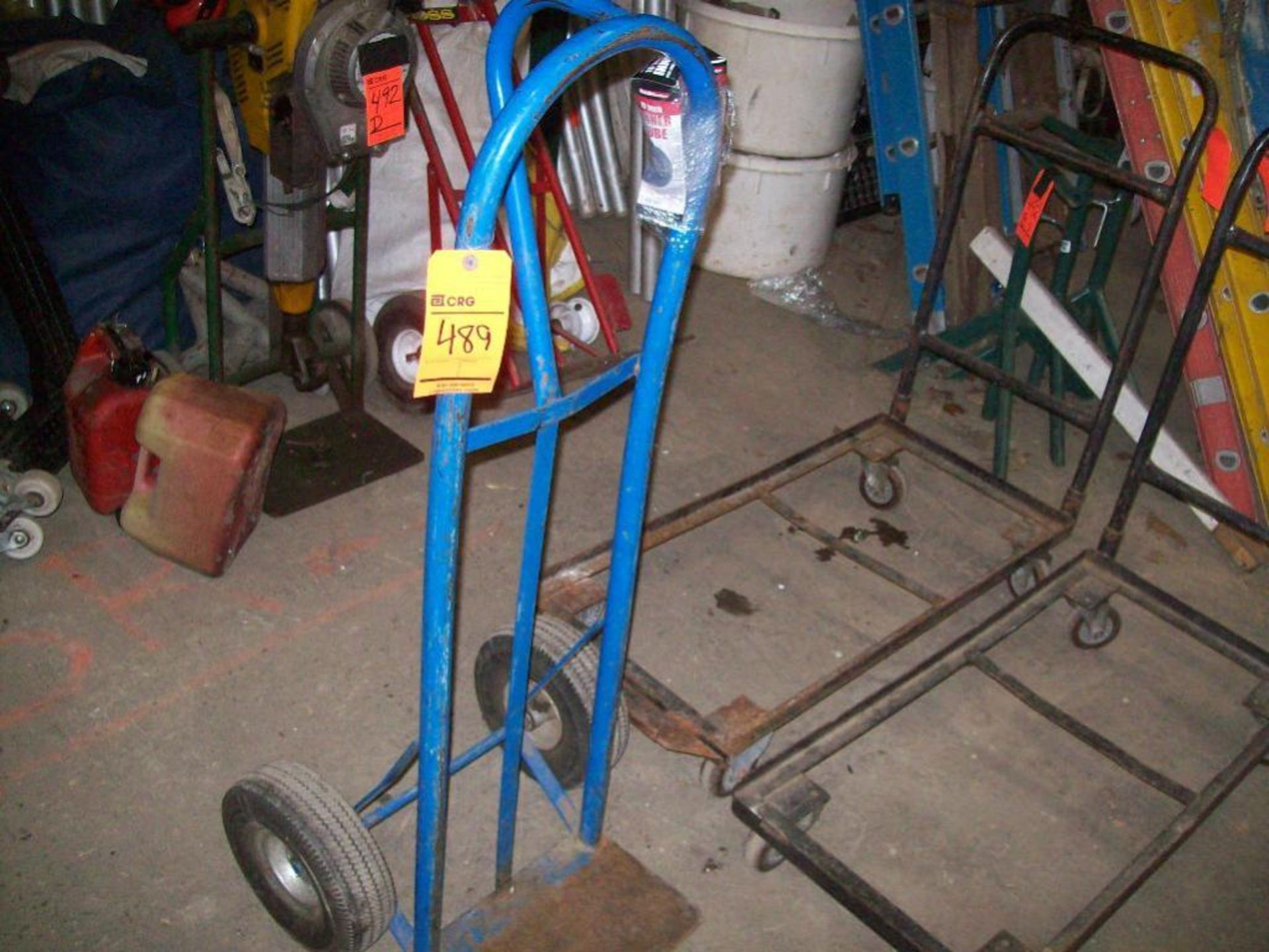 Lot of assorted dollies including (2) 2 wheel hand trucks, (4) metal framed wheel dollies, and (1) - Image 2 of 2