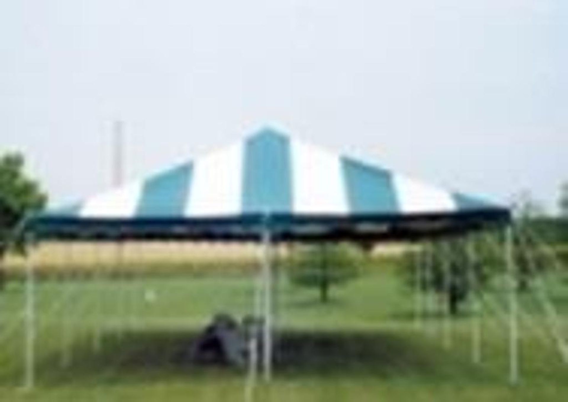 Anchor 20' x 40' green and white canopy, canopy only, has repairable tear