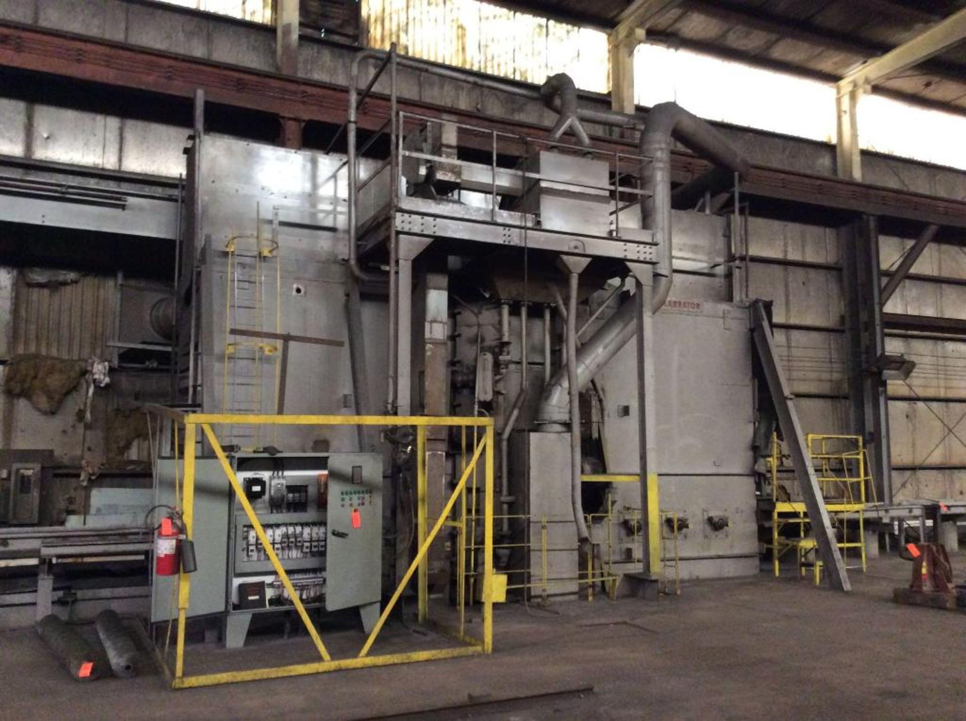 Wheelabrator pass thru blast finishing machine, with approx. 300' infeed and outfeed conveyor, 8