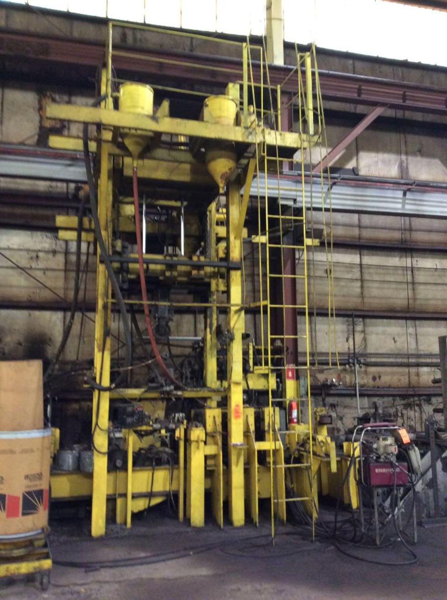 Vertical twin sided girder welder, including Enerpac hydraulic package, and (2) Lincoln NA-35 wire