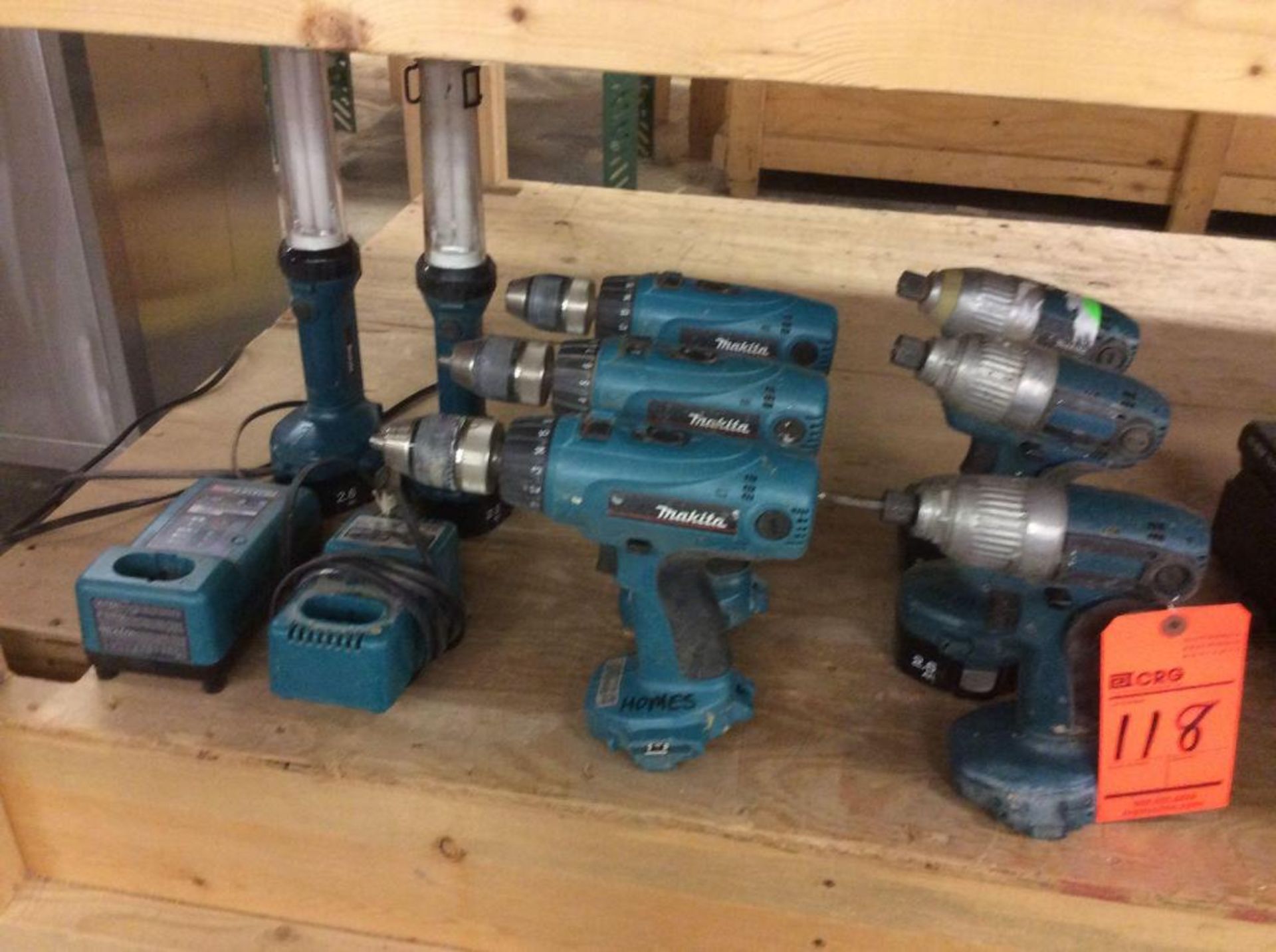 (6) Makita cordless drills with (2) chargers and (4) batteries, and (2) lights