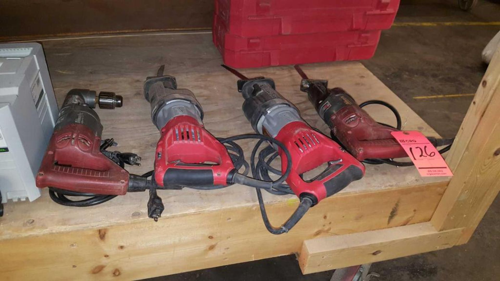 (3) Milwaukee reciprocating saws and (1) Milwaukee right angle drill, (2) cases