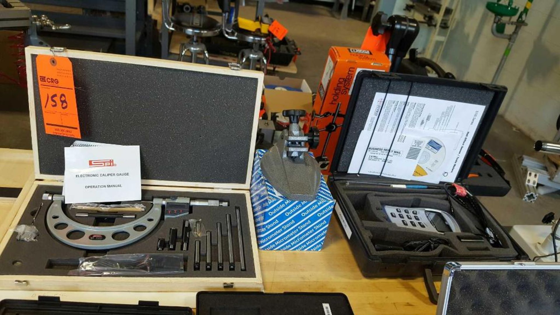 SPI digital micrometer, 0_6" x 0.00005", with case; micrometer stand.