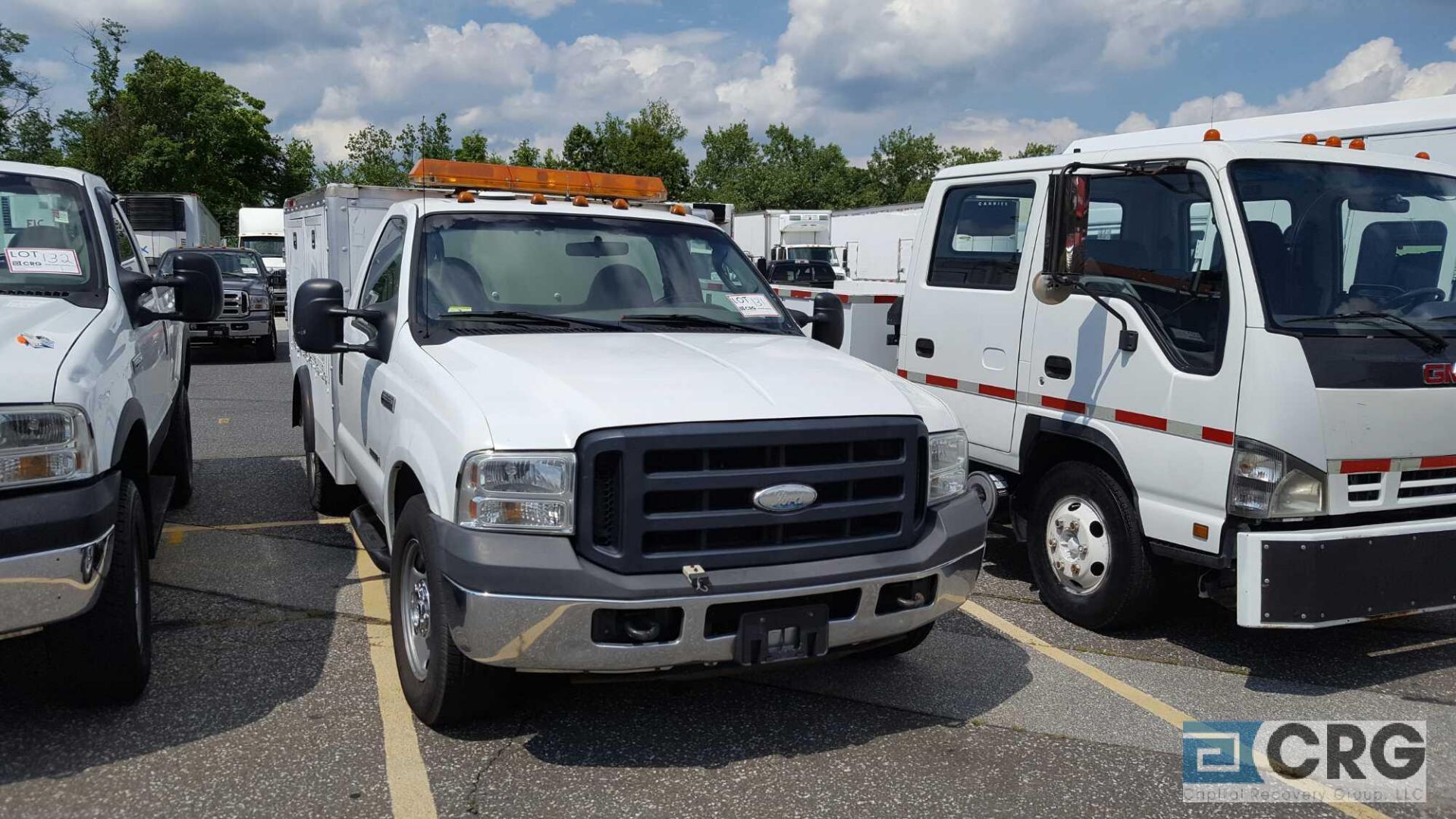 2006 Ford F 350 Utility Truck, Auto transmission, AM/FM Radio, manual windows and locks, 3 passenger