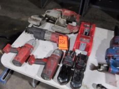 Lot assorted tools including: (1) band saw, (1) reciprocating saw, (2) drills, (4) batteries, and (2