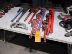 Lot (11) assorted pipe wrenches, and (1) pipe cutter