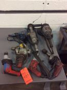 Lot of electric hand tools including drills, right angle grinder, and buffer