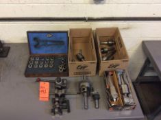 Lot of machinist tooling including tool post with holders, drill chucks, live and dead centers, spri