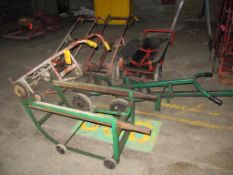 Lot of (5) assorted barrel carts, and (1) horizontal stand