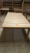 38" X 60" unfinished cherry wood dining table, extends to 78" (NEW)
