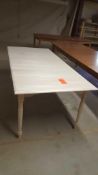 An unfinished Birch dining table, 38 " X 60", extends to 78"