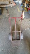 Lot includes (1) three-tier metal cart (no contents), (1) 4-wheel dolly, (2) hand trucks, and (1) 4'