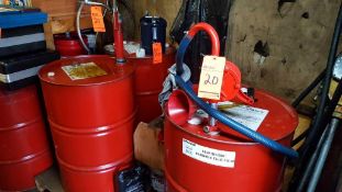 Lot of (4) assorted 55-gallon drums of assorted lubricants with (3) assorted barrel pumps, etc.