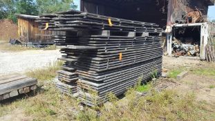 Lot of approximately (58) pieces assorted air dried, wide pine, 10 foot lengths