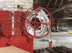 Lot of (4) fire hose reels ( ONE ON WALL IS NOT INCLUDED, ONLY NEW IN BOXES)