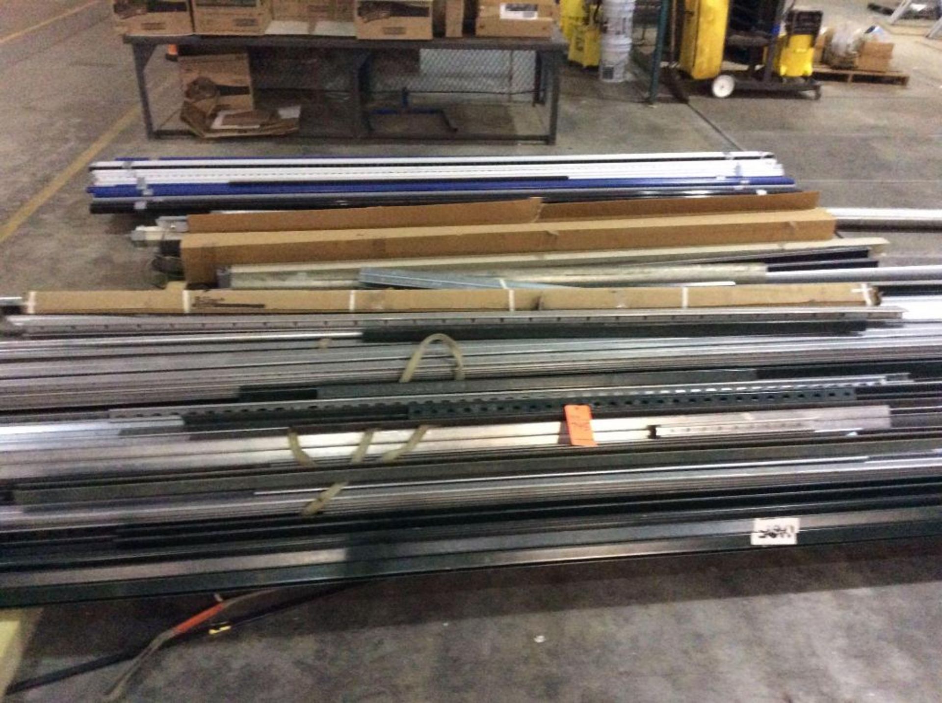 Lot of asst steel channel, sign post steel, and bats with plastic rollers and colored pipe