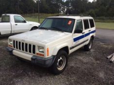 2000 Jeep Cherokee sport, VIN 1J4FF4853YL5168676, 4- wheel drive, automatic transmission, 4.0