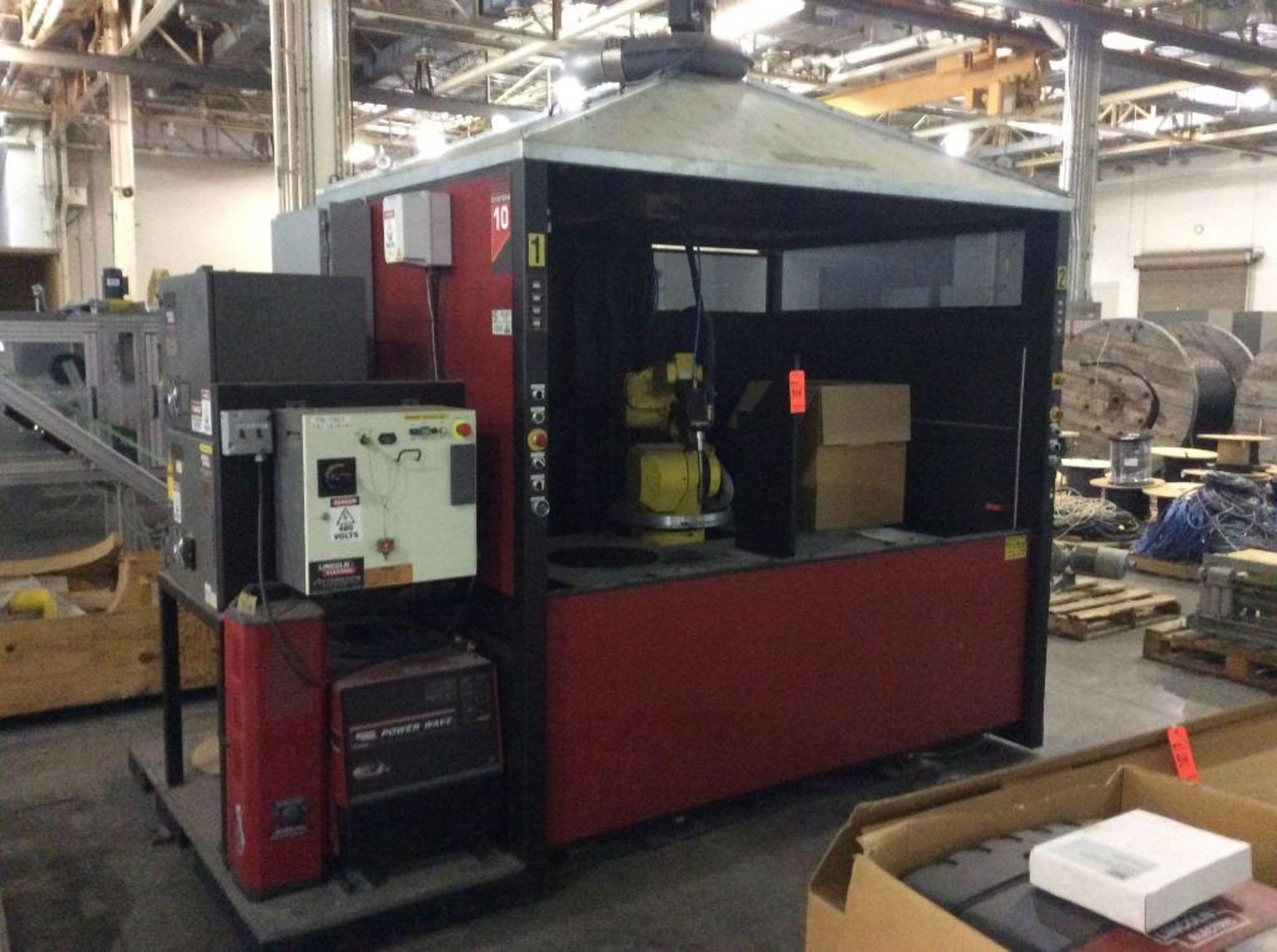 Robotic welder including Fanuc robot ARC MATE 100IBE and Lincoln 8' x 6' x approx 11' high enclosure