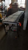 One expandable, accordion type, portable, skate conveyor, 10' x 2' collapsed