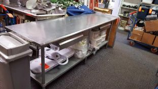 One 8' stainless steel kitchen table, with two drawers and under shelf, no contents