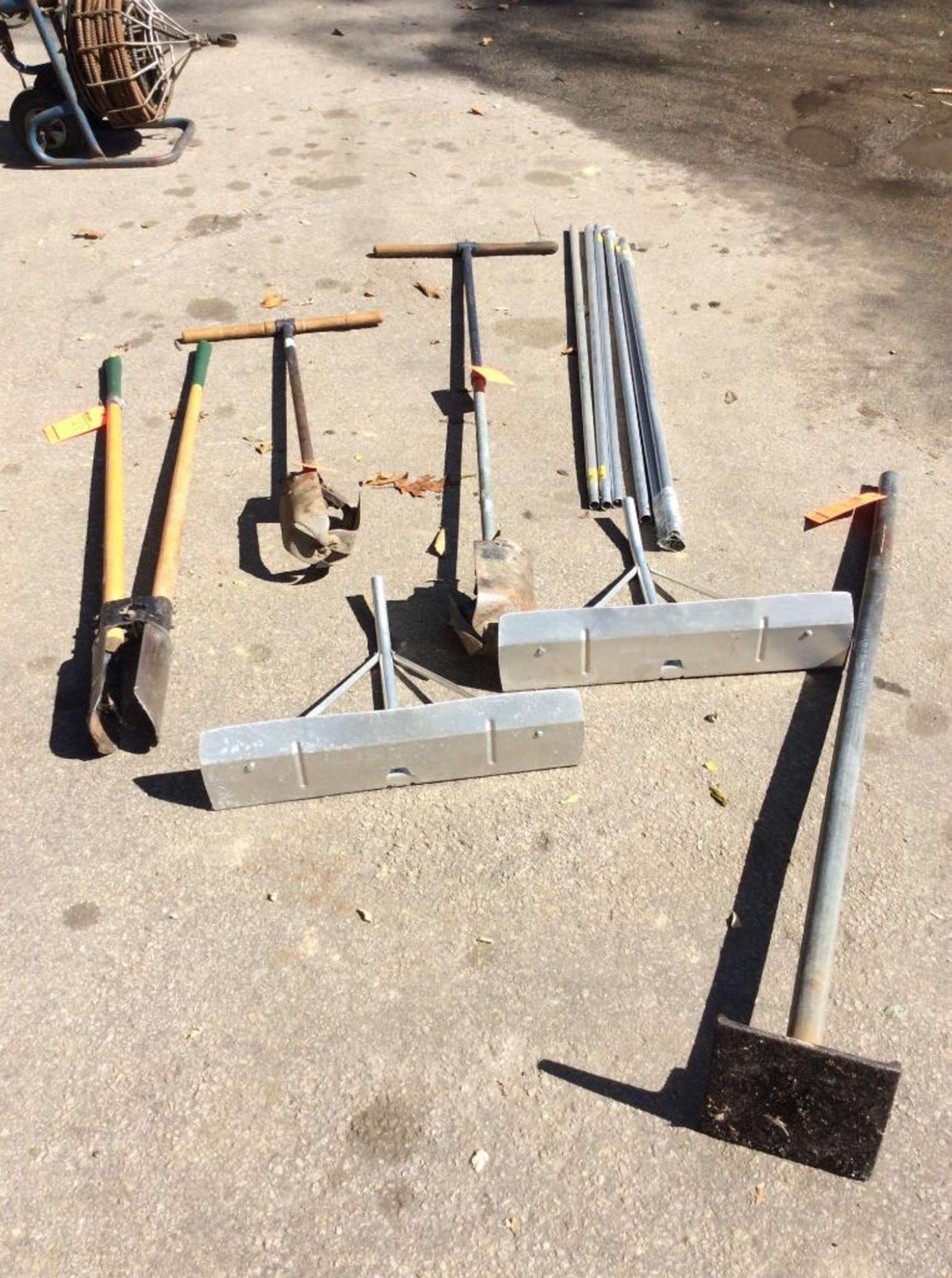 Lot of assorted yard tools, including (3) assorted manual post hole diggers, and (1) tamper, and (2)