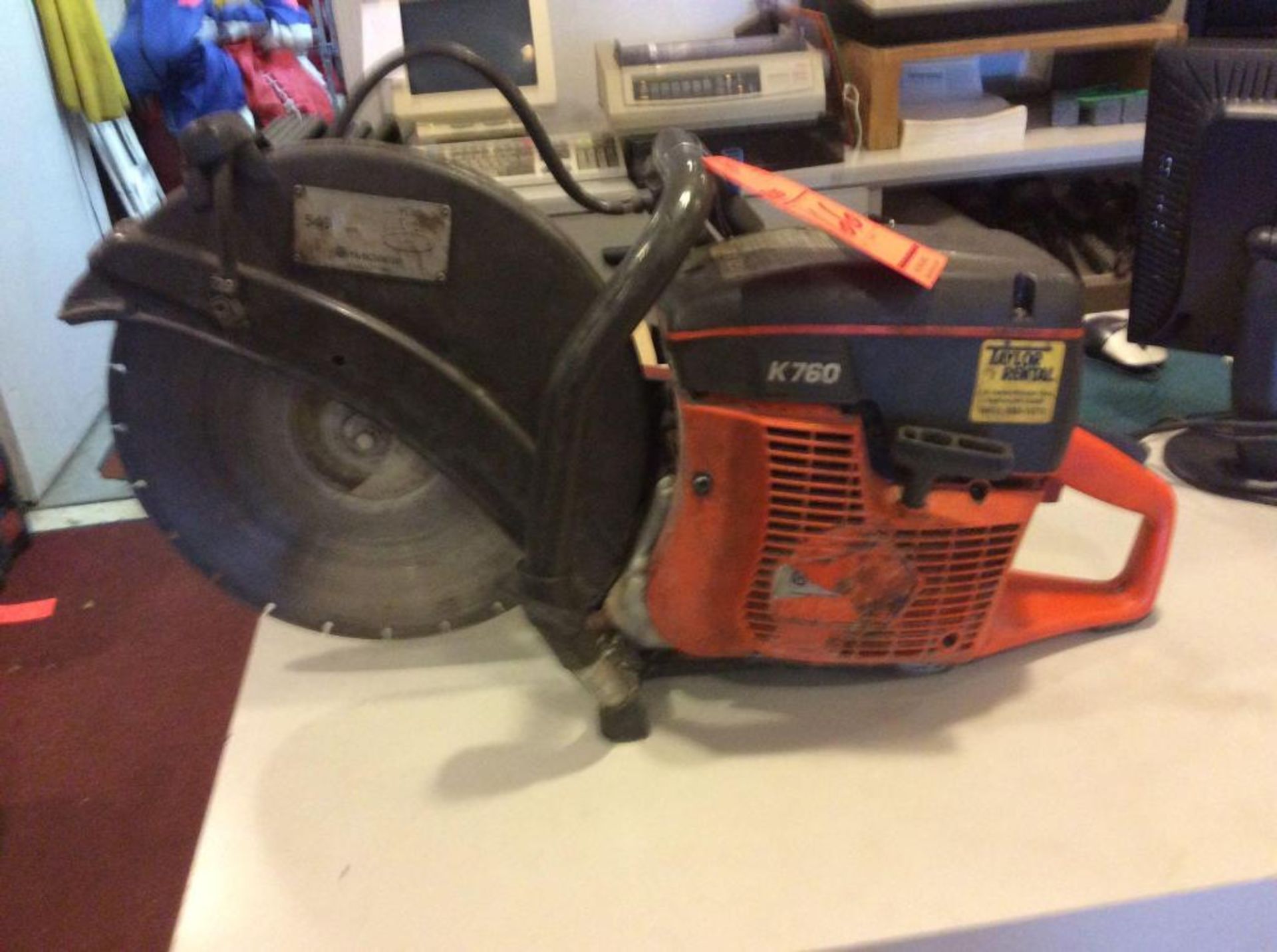 Husqvarna, model K760, gas powered chop saw, 2 cycle, with diamond blade, hard rope pull starter