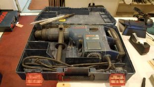 Bosch heavy duty electric hammer drill, model 11245 e V s, with two bits and case