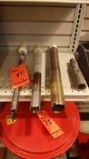 Lot of (3) assorted core drill bits and one bit extension, including (1) 2", (1) 1 1/2", and (1) 1"