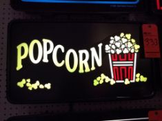 Gold medal popcorn sign