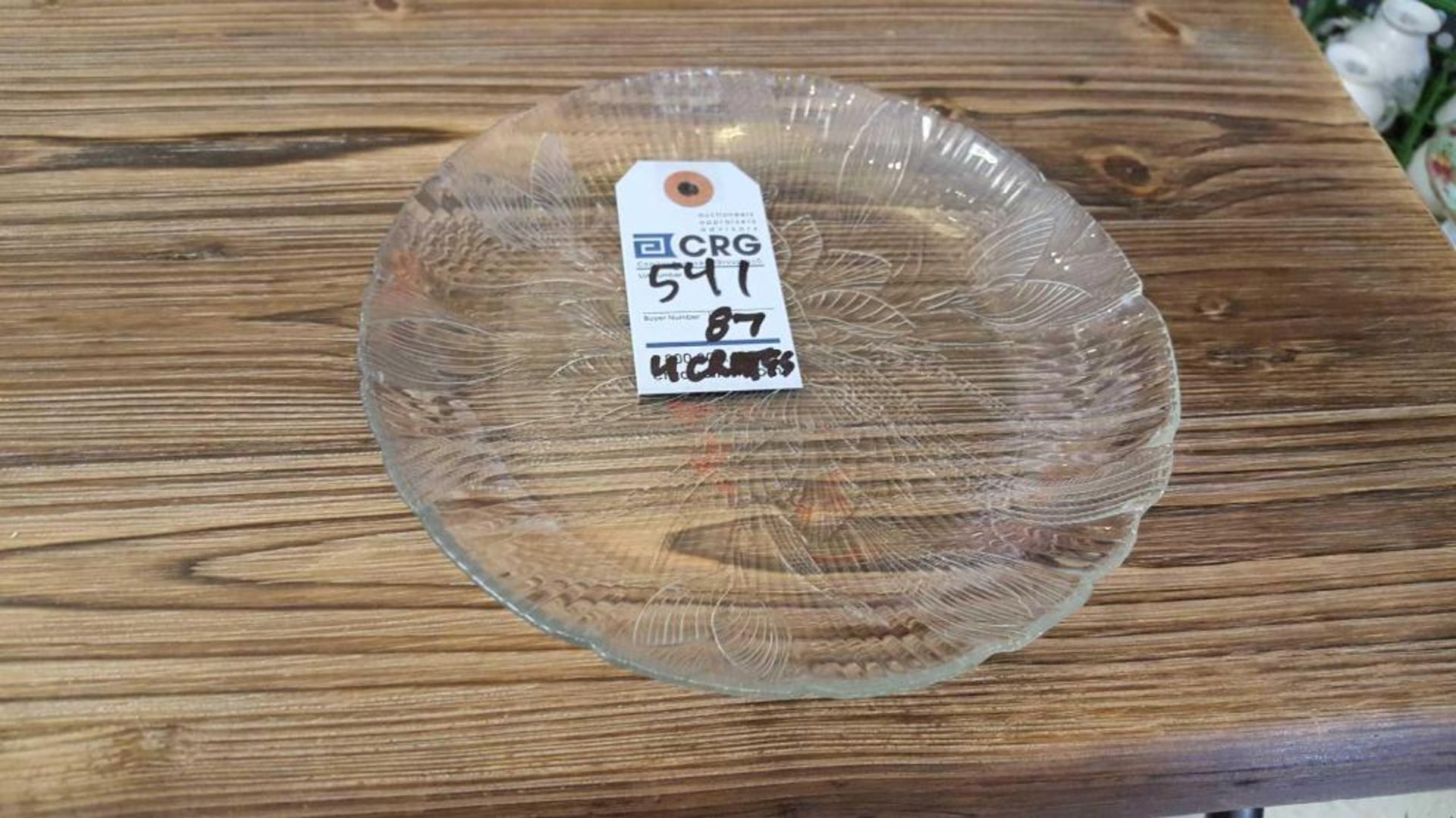 Lot of (87) glass luncheon plates, 7", in 4) wire crates. Add'l fee of $8.00 per wire crate