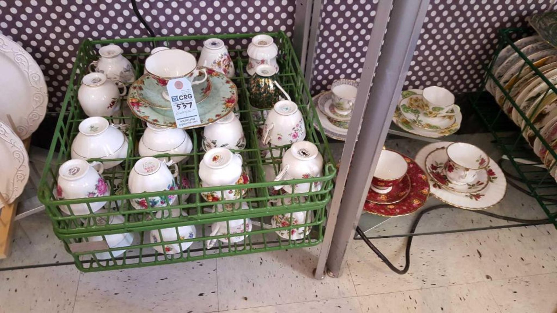Lot of assorted vintage china cups, saucers, and dessert plates, in (6) wire crates. Add'l fee of $8