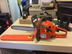 Husqvarna, model 240, 2 cycle chain saw, with16" bar