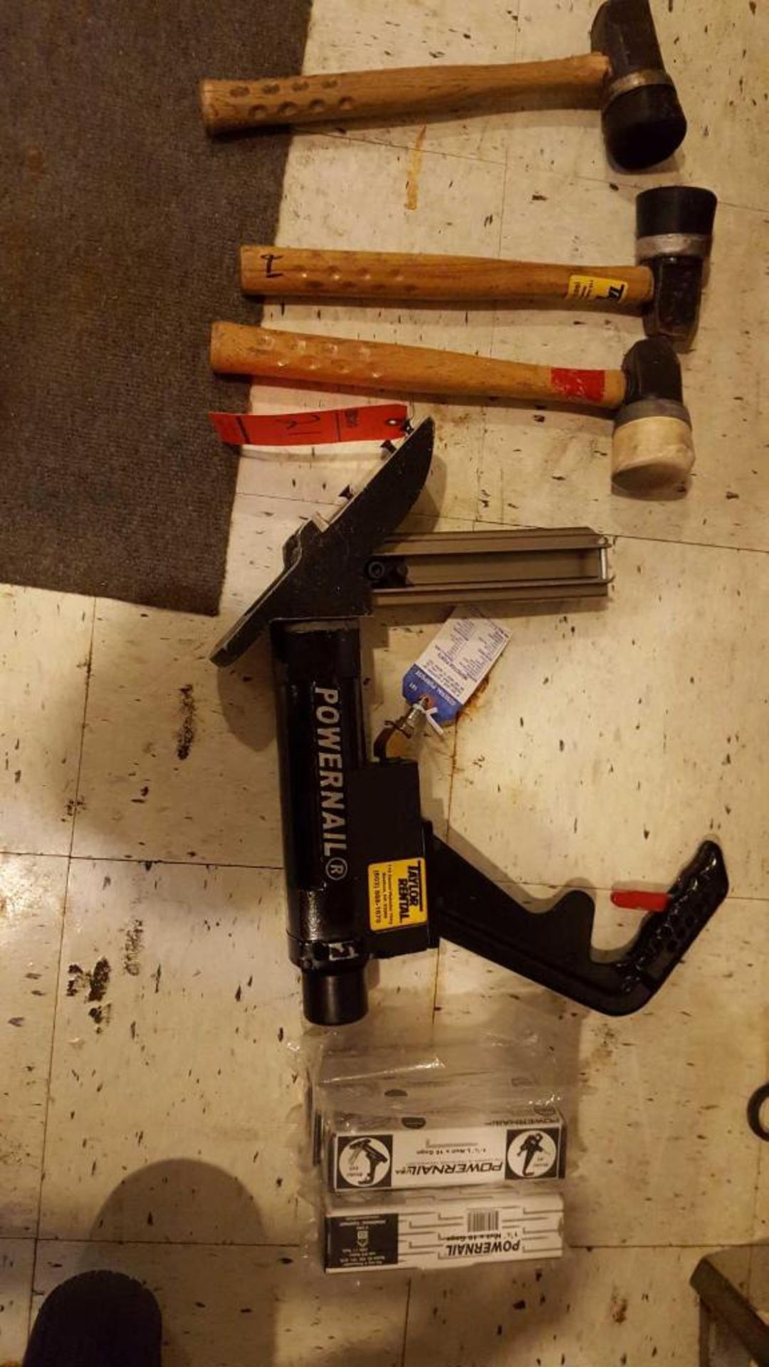 Powernail floor nailer model 445, with (3) hammers, and (8) boxes of nails
