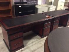 Lot of 2 leather-top double pedestal office desks, and 3 - 48" diameter Metal base tables