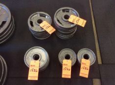 Lot of VTX weight plates including (14) 10 lb, (8) 5 lb, and (16) 2.5 lb