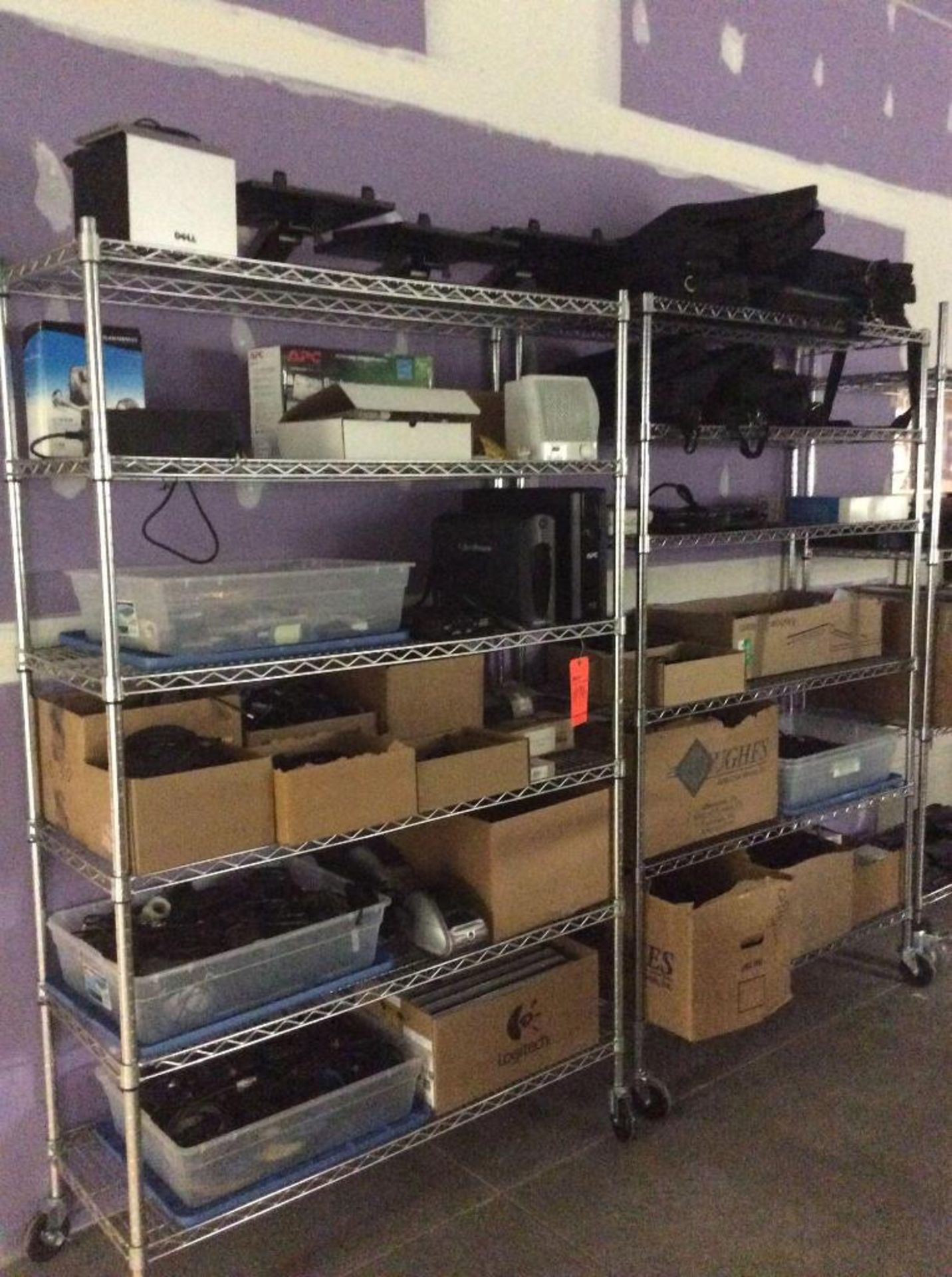 Large lot of assorted IT equipment contained on 7 rolling racks - includes monitors, printers, wires - Image 4 of 4