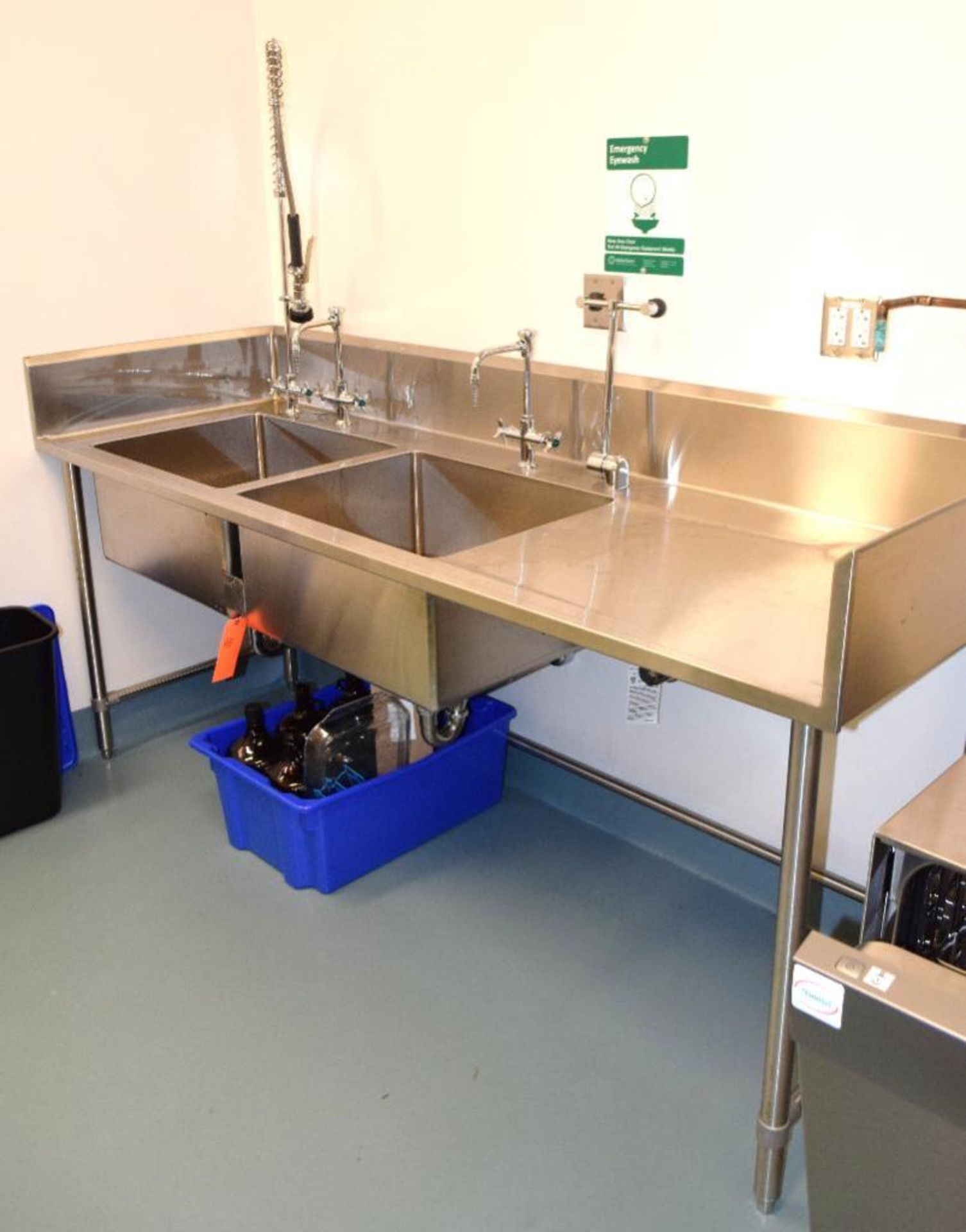 Stainless Steel Double Sink, Approximate 88" long x 30" wide.