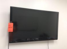 42" Sharp flatscreen tv (located inside lot 1070 suite)