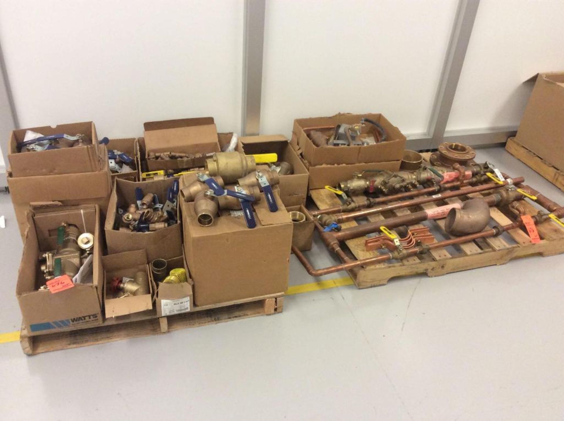 Lot of asst brass fittings and valves and copper plunbing, contents of 2 skids