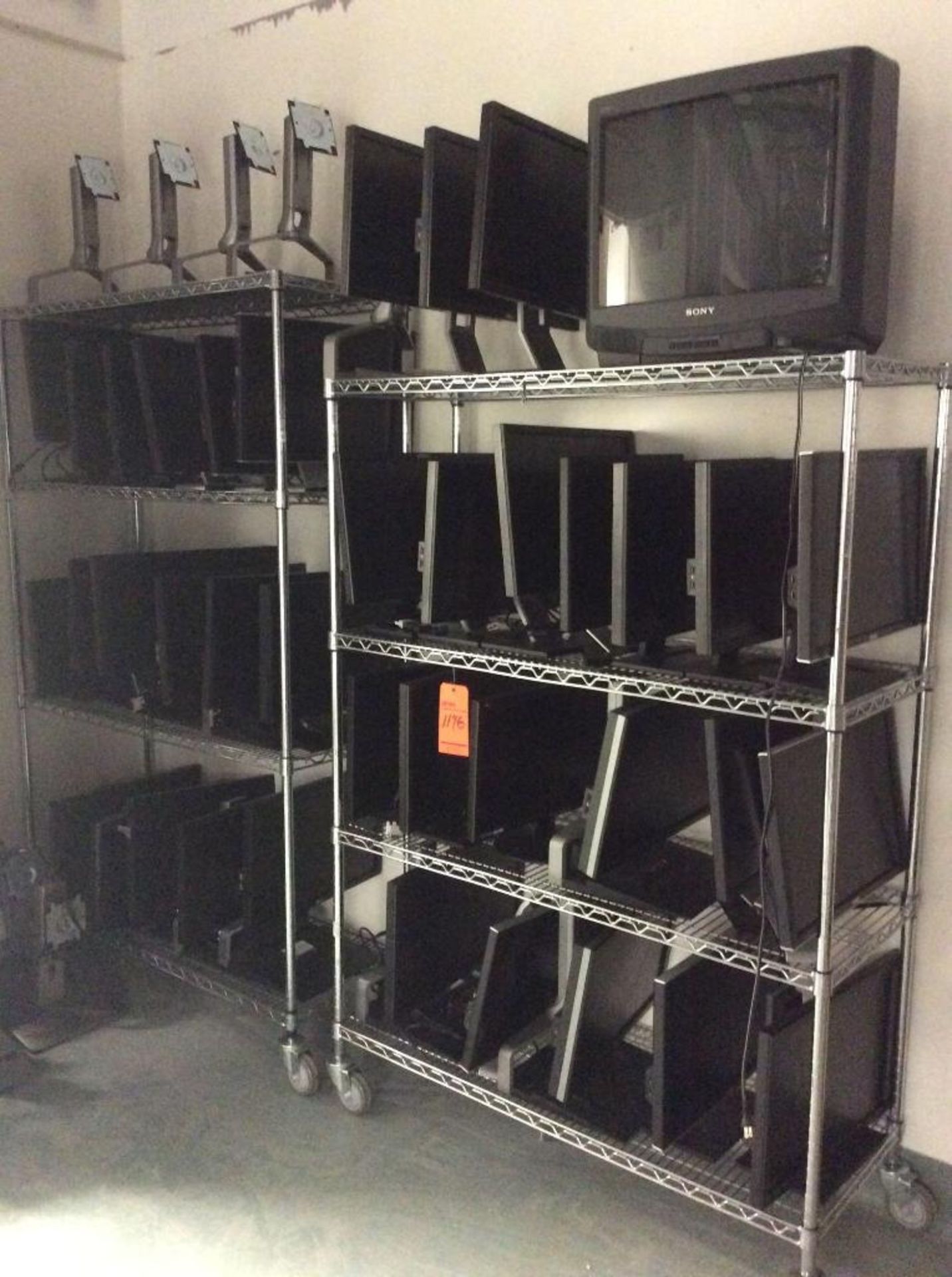 Large lot of assorted IT equipment contained on 7 rolling racks - includes monitors, printers, wires - Image 2 of 4