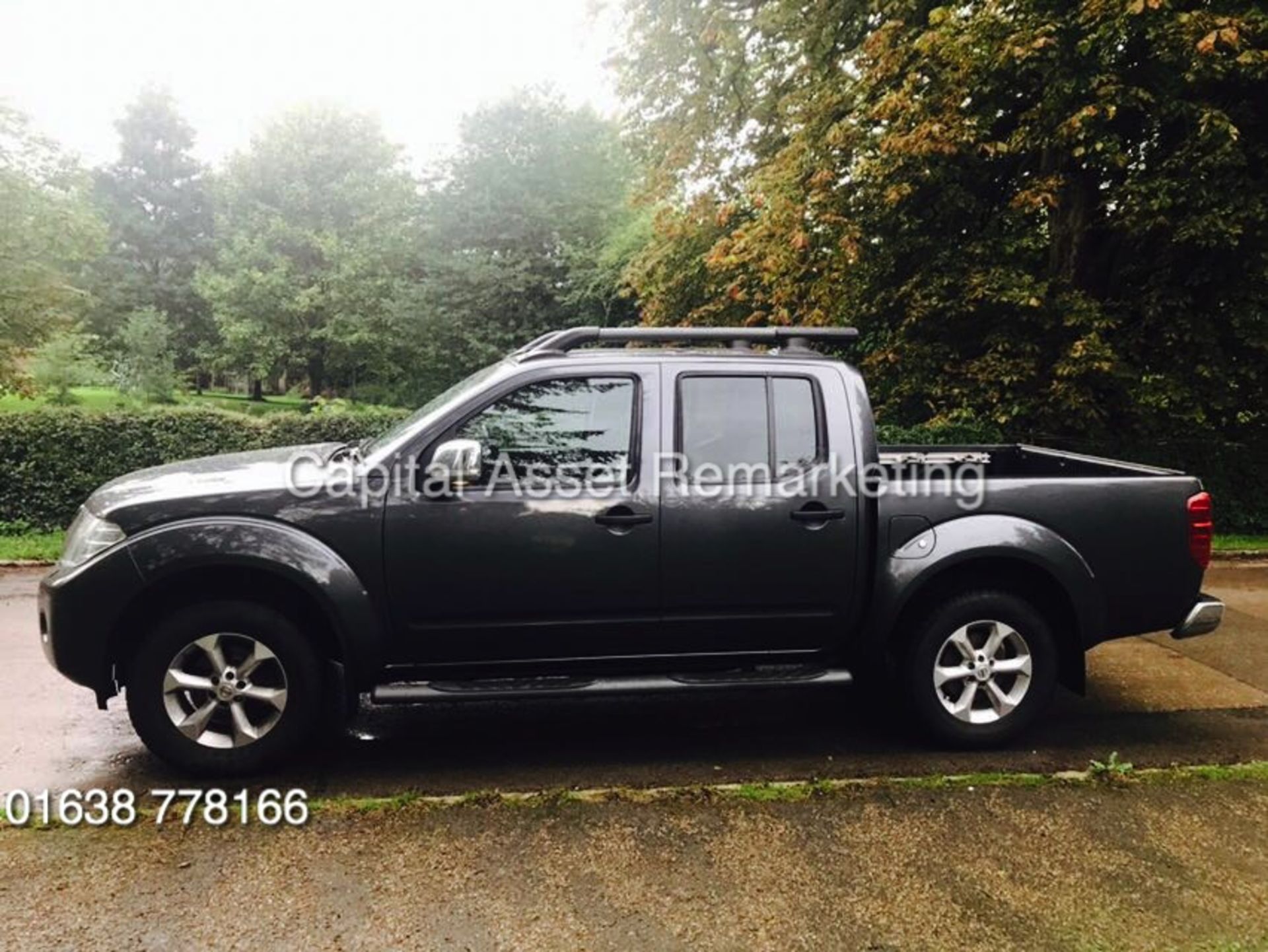 NISSAN NAVARA 2.5DCI "TEKNA AUTO" D/C 4 DOOR (15 REG) SAT NAV - AIR CON - LEATHER - 1 OWNER FSH !!!