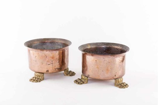 TWO COPPER CACHEPOTS | DUE CACHEPOT Couple of copper cachepots in a circular shape with flared