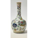 A Chinese porcelain famille rose vase, decorated dragons amongst flowers and foliage,