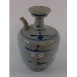 An oriental blue and white Kendi, 21.