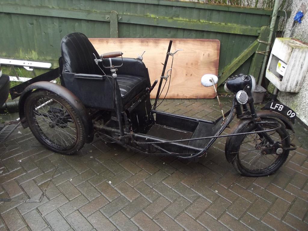 A 1940s Argson Runnymede Invalid Carriage restoration project, black.