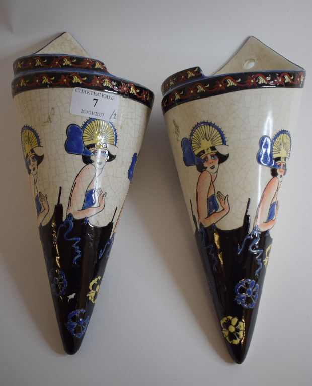 A pair of Art Deco style pottery wall po